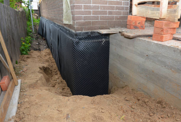 Happy homeowners after waterproofing job in Bon Aqua